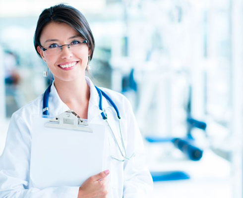 pgx-clinically-tested Female Doctor, smiling with a medical environmentbackground